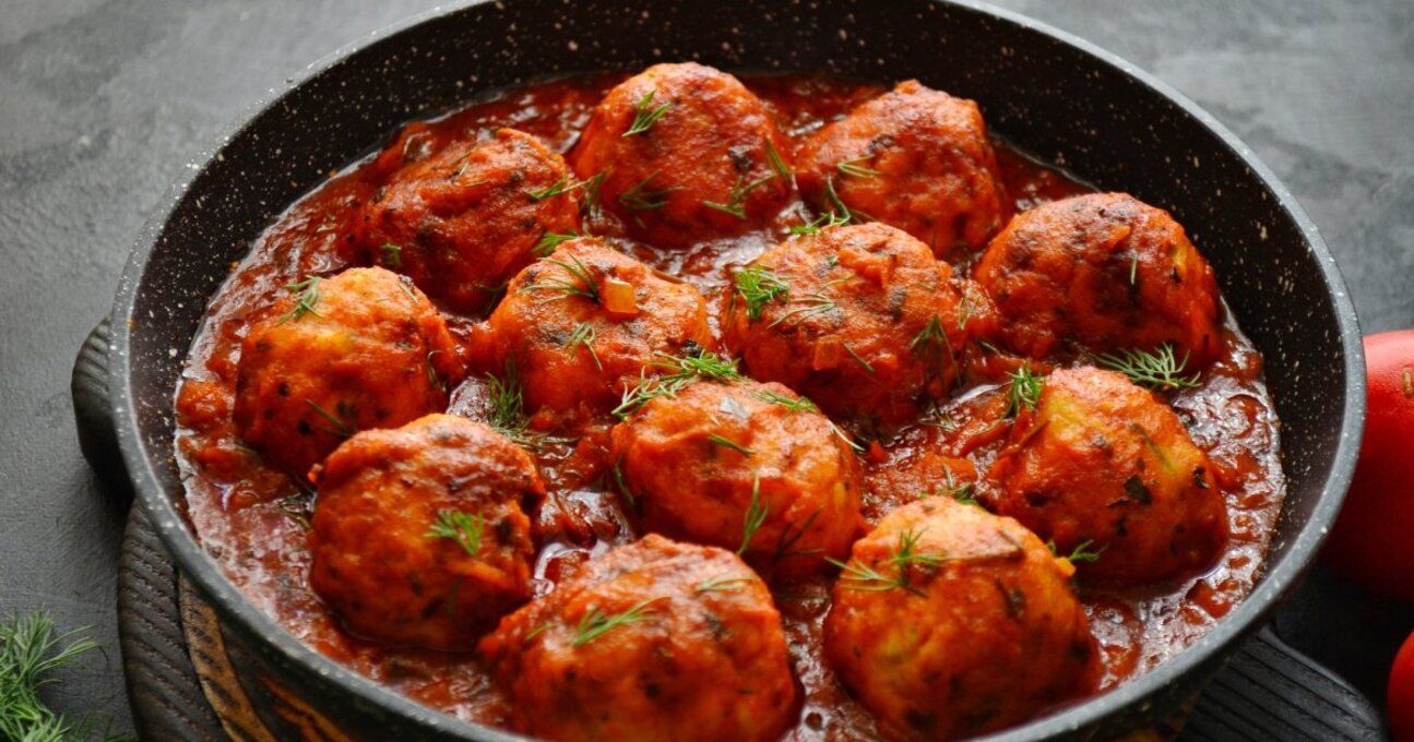 Котлети з сиром в томатному соусі - фото 1