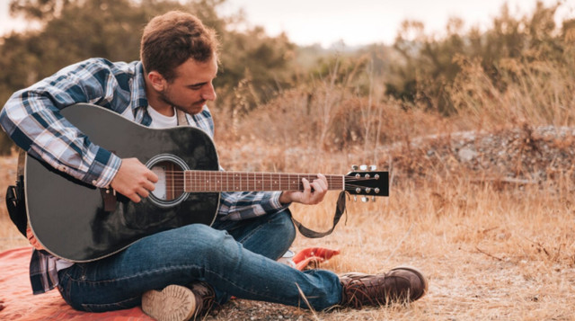 Гра на гітарі допомагає перезавантажити мозок - фото 561353