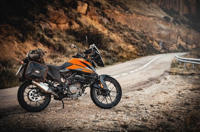 Мотоцикл для приміських поїздок: як вибрати економний та витривалий байк - фото 612376